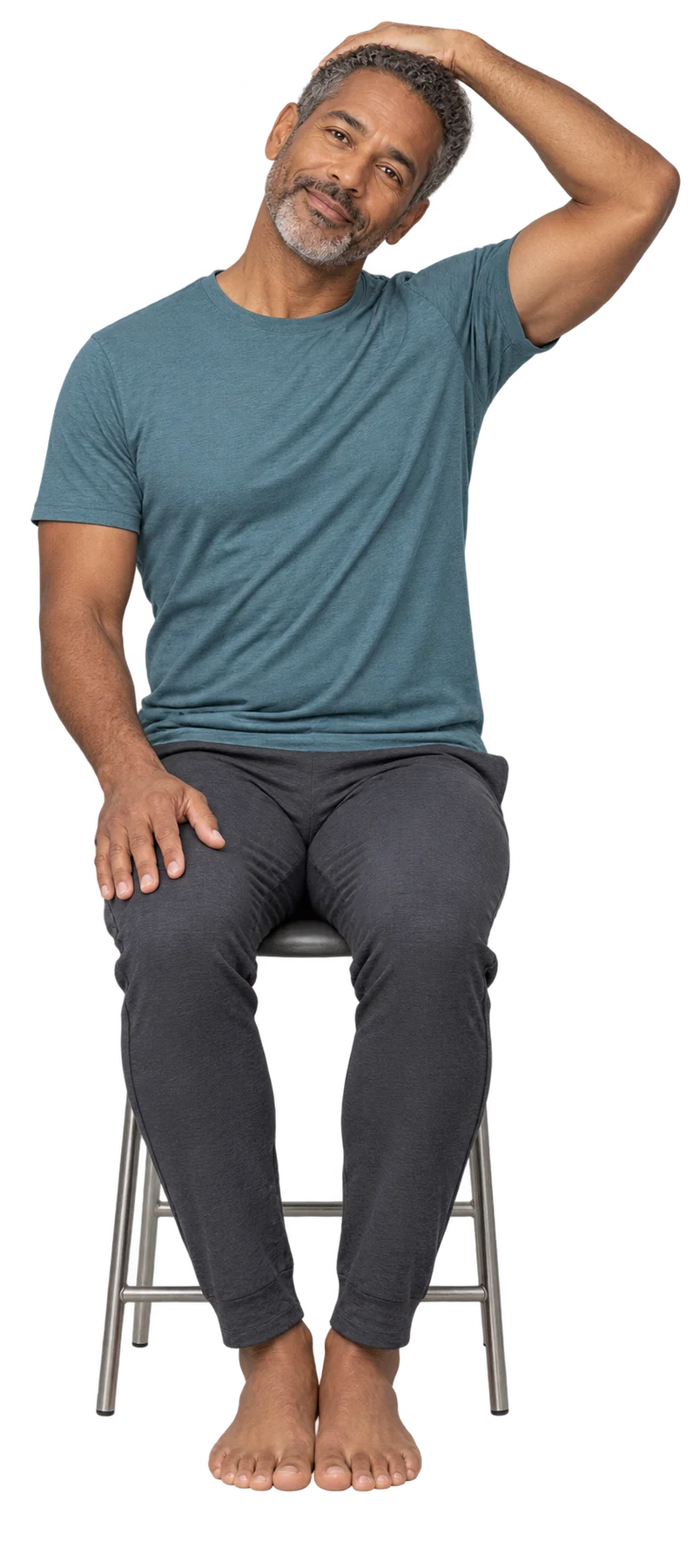 Man seated on a stool performing a gentle sideways neck stretch
